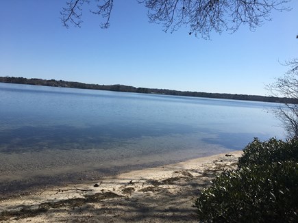 Centerville -Lake Wequaquet Cape Cod vacation rental - Walk down off deck to beautiful beach to enjoy swimming and lake.