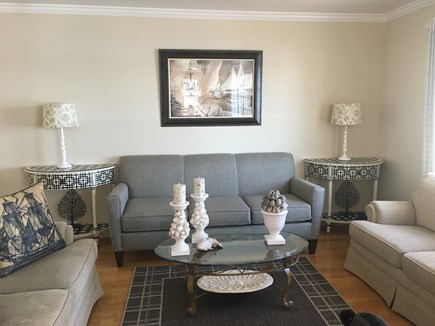 Centerville -Lake Wequaquet Cape Cod vacation rental - Living room with ample seating to open dining area beautiful view