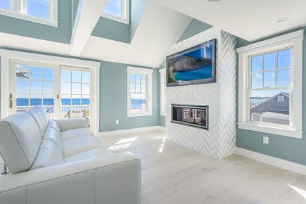 Centerville, Craigville Beach Road Cape Cod vacation rental - Beautiful open fireplace room with 65 in smart tv.