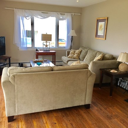 Dennis Port Cape Cod vacation rental - Family room, TV, sliders to patio