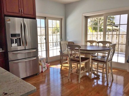 Harwichport Cape Cod vacation rental - Dining seats 6 plus 4 bar stools.  Outdoor table for 10.