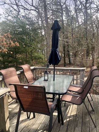 Brewster Cape Cod vacation rental - Deck off kitchen with full deck set, grill and gas firepit