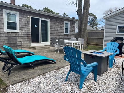South Yarmouth/Bass River Cape Cod vacation rental - Outdoor dining, fire table, and Weber Grill are ready!