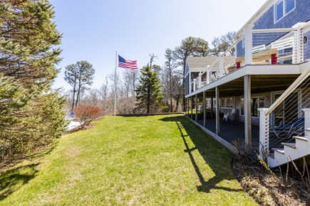 Orleans Cape Cod vacation rental - View of back yard and deck - lots of room for outdoor activities