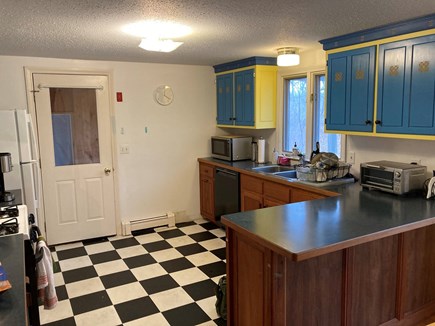 Eastham Cape Cod vacation rental - Kitchen with custom cabinetry.