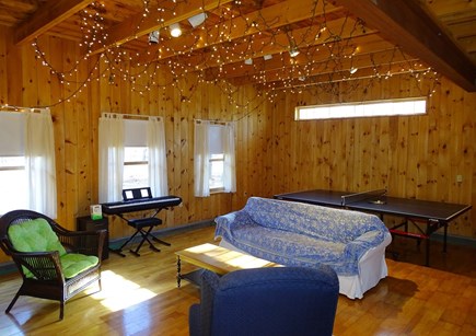 Eastham Cape Cod vacation rental - 1st fl.: Addition family room, 3rd bath, ping-pong, keyboard.