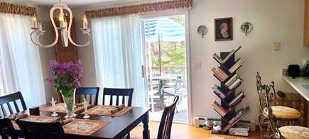 Truro Cape Cod vacation rental - Dining area includes the breakfast bar and colorful cookbooks