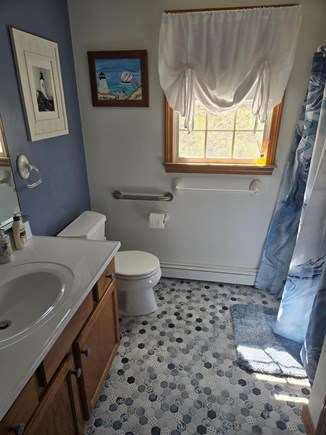Truro Cape Cod vacation rental - Downstairs Bathroom with a shower and laundry closet