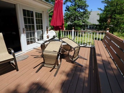Dennis Cape Cod vacation rental - Deck with Furniture and grill on ground level