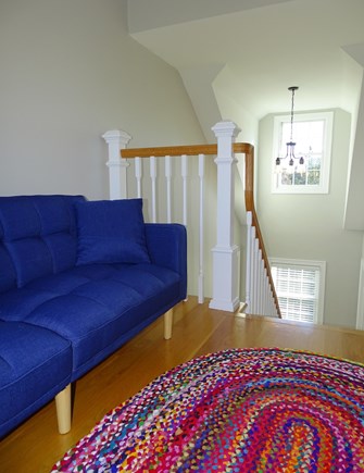 Eastham Cape Cod vacation rental - Third level sitting area with futon, slider to upper deck