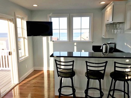 Plymouth MA vacation rental - Third floor bar with ocean views, opens up to roof top deck