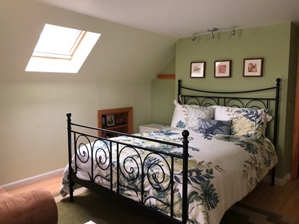 Eastham Cape Cod vacation rental - Second floor bedroom with queen bed, couch and desk