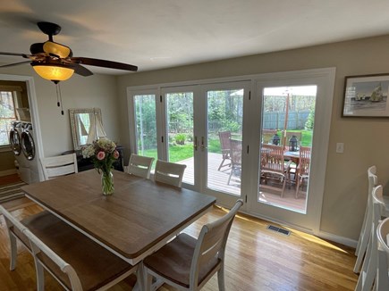 Eastham Cape Cod vacation rental - Dining table w/ patio access (expands with an extra leaf)