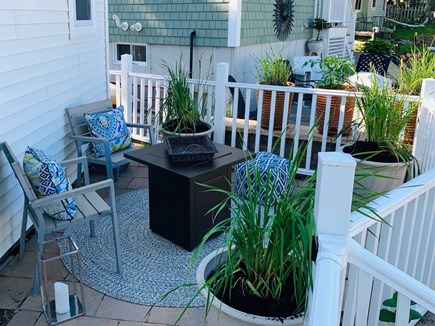 Bourne, Buzzards Bay Cape Cod vacation rental - Back patio and gas fire pit.
