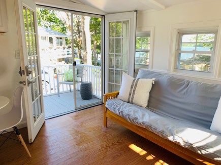 Bourne, Buzzards Bay Cape Cod vacation rental - French doors leading to back patio and water views.