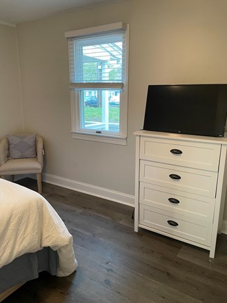 South Yarmouth Cape Cod vacation rental - Master bedroom with dresser, closet and 32 inch smart TV.