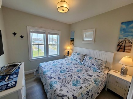 West Yarmouth Cape Cod vacation rental - Bedroom on 1st floor, King bed, TV and water view of Mill Creek