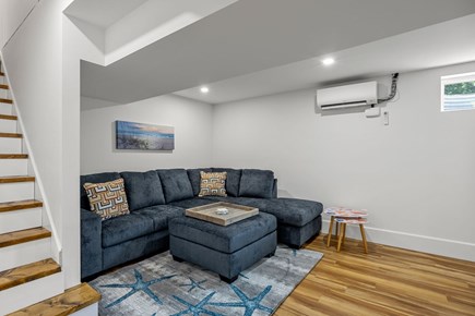 Barnstable Cape Cod vacation rental - BRAND NEW BASEMENT SPACE! Lounge on this new couch w/TV!