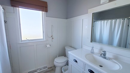 Truro Cape Cod vacation rental - Main floor bathroom with tub/shower