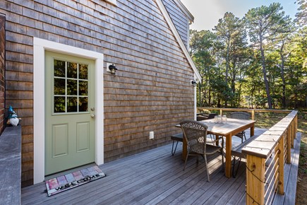 Eastham Cape Cod vacation rental - Dining table on the wrap-around deck