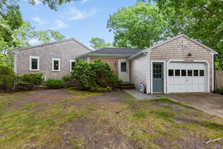 West Yarmouth Cape Cod vacation rental - Side entrance with parking in front of garage