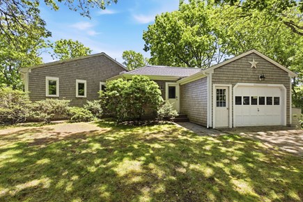 West Yarmouth Cape Cod vacation rental - Side entrance with parking in front of garage