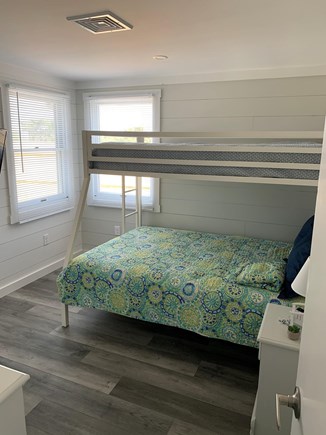Dennis Cape Cod vacation rental - Back bedroom with twin over full bunk