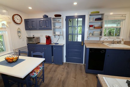 East Dennis Cape Cod vacation rental - Kitchen / dining towards porch