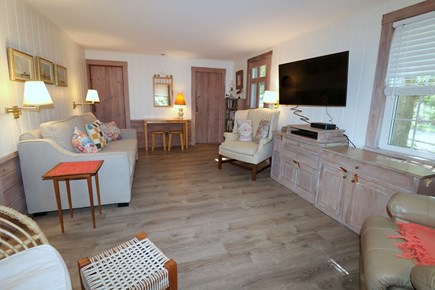 East Dennis Cape Cod vacation rental - Living room showing doors to the 2 bedrooms<br/>