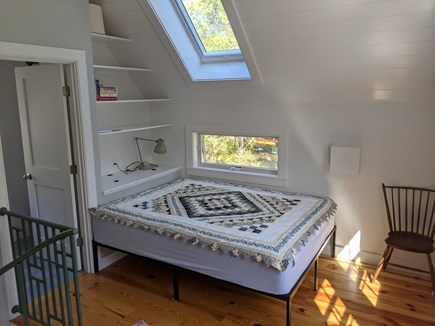 Orleans Cape Cod vacation rental - Queen bed with awning window and skylight above.