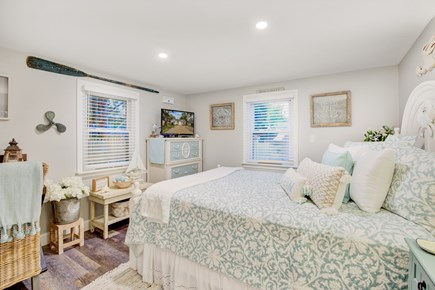 Yarmouth Cape Cod vacation rental - Queen bedroom with desk/chair, smart TV/DVD, and charging  ports.