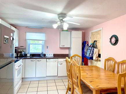 Dennis Port Cape Cod vacation rental - Bright eat-in kitchen with 6-person table, Keurig, and more.