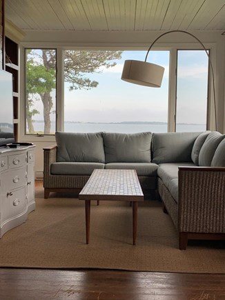 Yarmouth Cape Cod vacation rental - Sunroom with TV and cozy seating for reading, gaming, napping...
