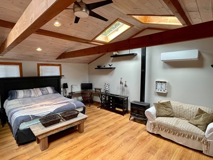 Hyannis Cape Cod vacation rental - Grandmaster bedroom with king size bed, skylights & exposed beams