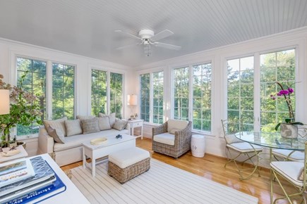 Osterville Cape Cod vacation rental - Sunroom overlooking back yard and pond with access to large deck