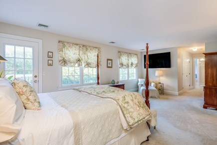 Osterville Cape Cod vacation rental - Master bedroom with queen bed and door to rooftop deck