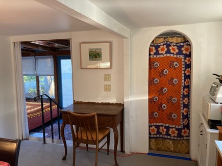 Provincetown, Historic East End, independent Cape Cod vacation rental - Sunroom left, door to study, right.