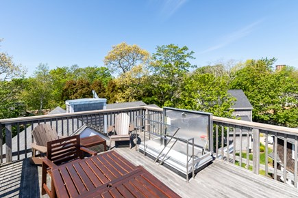 Woods Hole Cape Cod vacation rental - Roof deck, with Adirondack chairs and dining table.