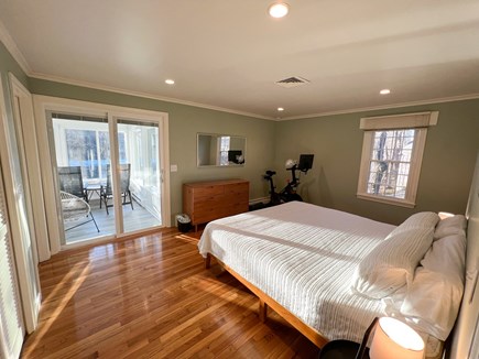 Brewster Cape Cod vacation rental - The pimary bedroom, which opens onto the sun room.