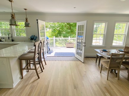 West Hyannisport Cape Cod vacation rental - French doors open to large back deck.