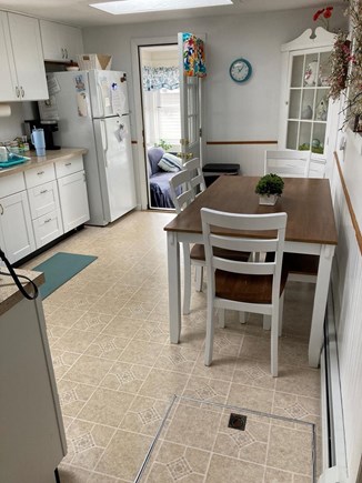 South Yarmouth right off of ro Cape Cod vacation rental - Bright kitchen with seating for sex