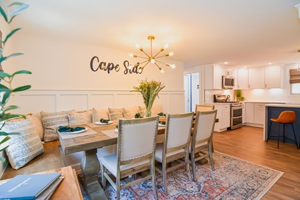 East Dennis Cape Cod vacation rental - Dining room table with built in bench