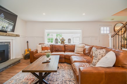 East Dennis Cape Cod vacation rental - Living room with Italian leather sectional