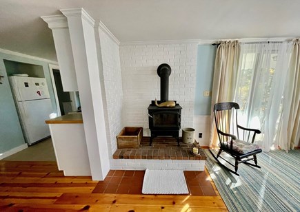 West Barnstable - off Route 6A Cape Cod vacation rental - Living room with windows on 3 sides & wood stove for off-season.