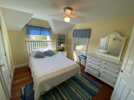 Chatham Cape Cod vacation rental - Queen bed attached to a hallway bathroom with pocket door