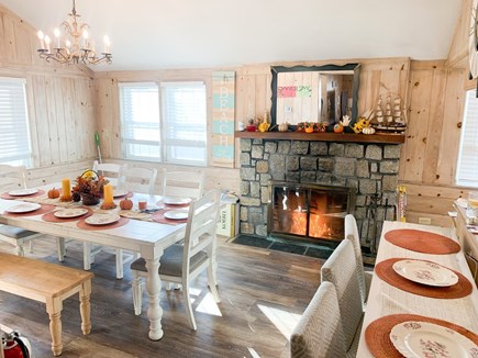 Dennis Port Cape Cod vacation rental - Dining room with fireplace.