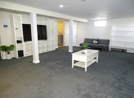 Hyannis, Barnstable Cape Cod vacation rental - Downstairs rec room w/ large TV, 1/2 bath, two futons & ping pong