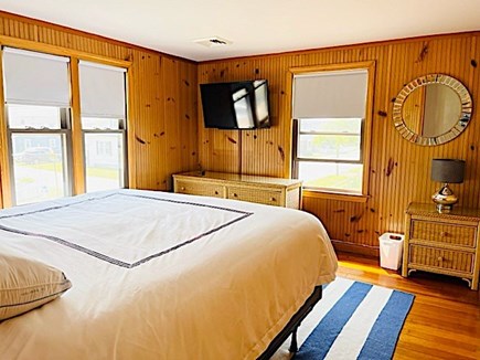 Falmouth Heights/Teaticket Cape Cod vacation rental - Second floor primary bedroom w/King bed, TV, and ocean views.