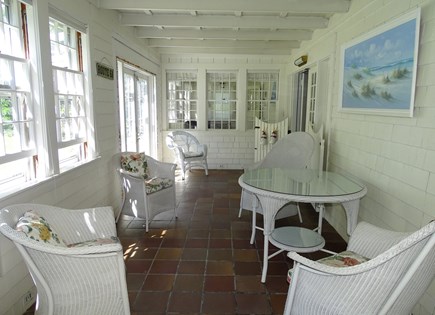 Dennis Cape Cod vacation rental - Sitting room on main floor, opens to side yard