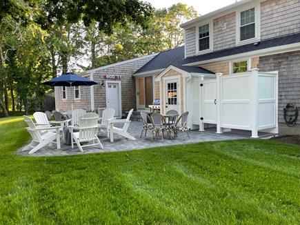 Yarmouth- Colonial Acres Cape Cod vacation rental - New 500sf patio with fire pit, outdoor dining and shower